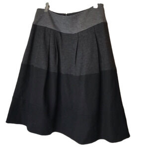 VINCE wool skirt in shades of black and grey. Size 6.